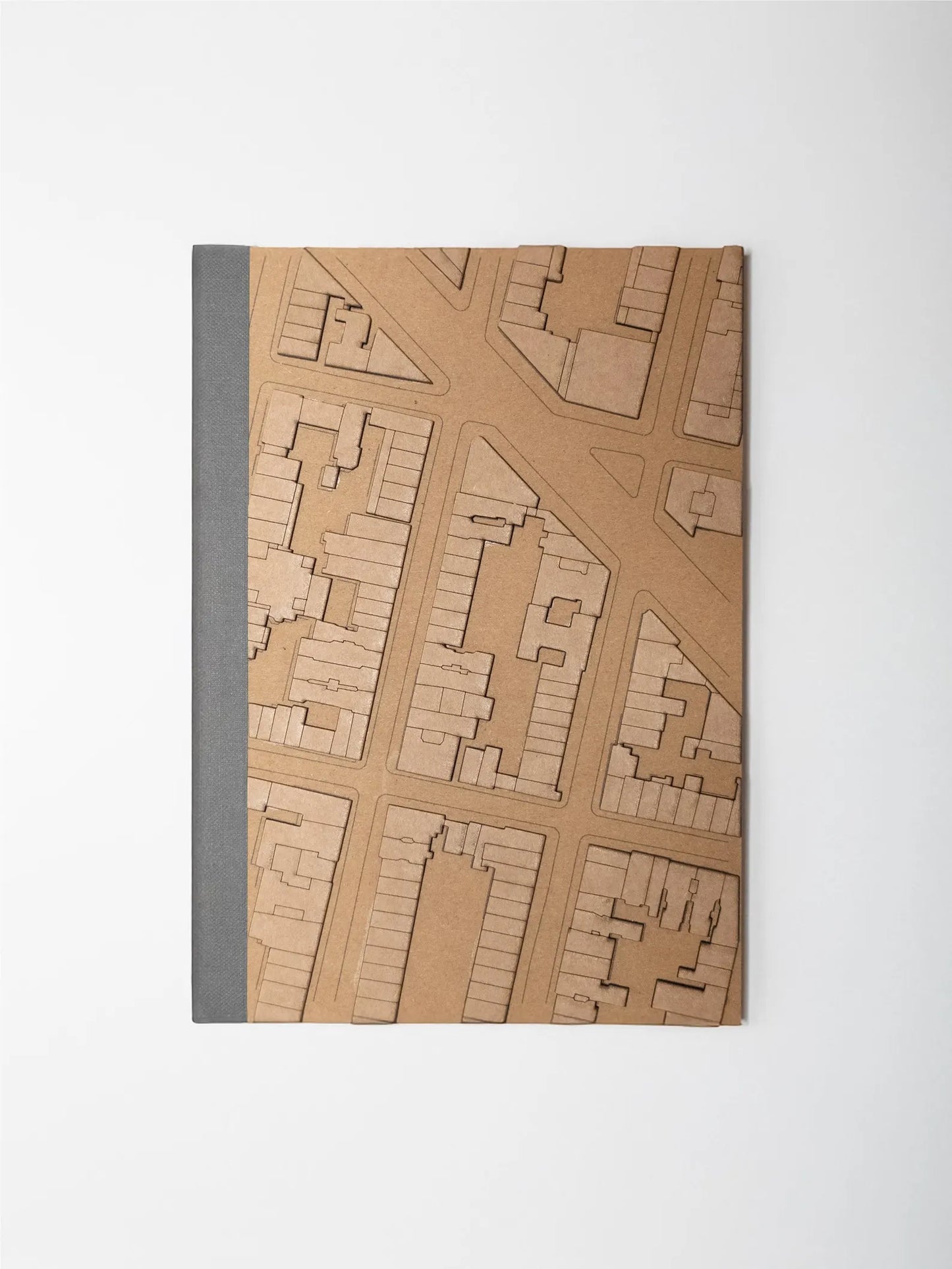 Notebook with a map design on the cover against a white background