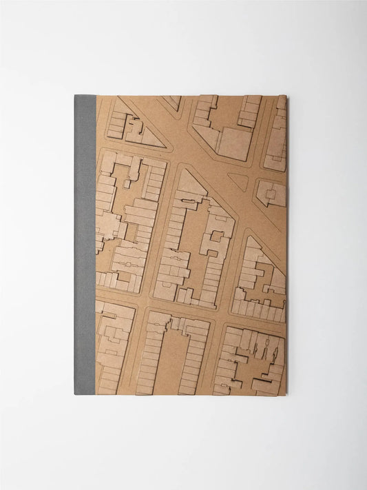 Notebook with a map design on the cover against a white background